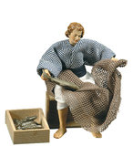 Fisher with fishes on wood-box 