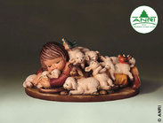 Lying shepherd with sheep 